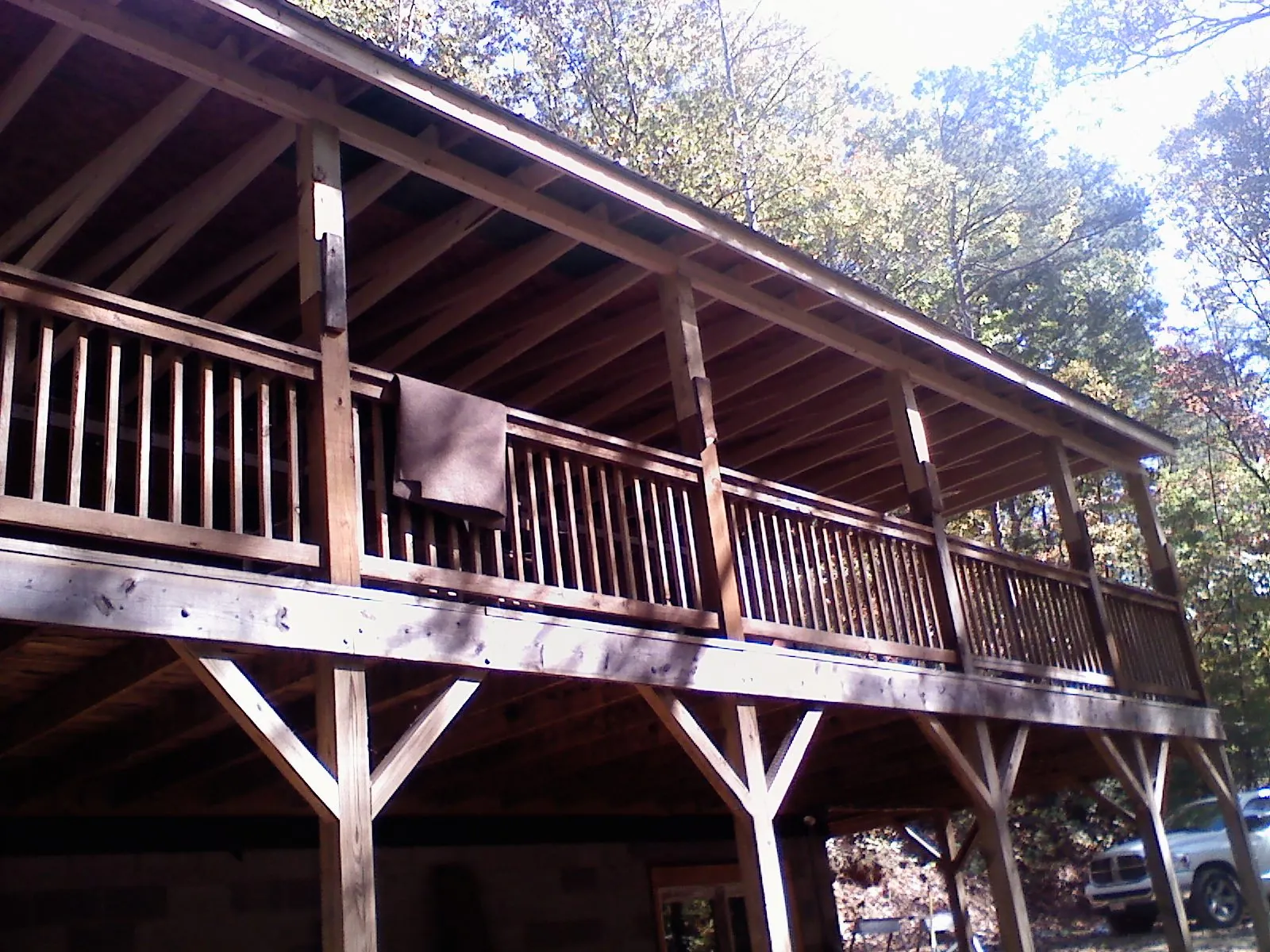 Timber framing under a new elevated porch and deck — Roof Leak Repair in Lawndale by Roofing Brothers